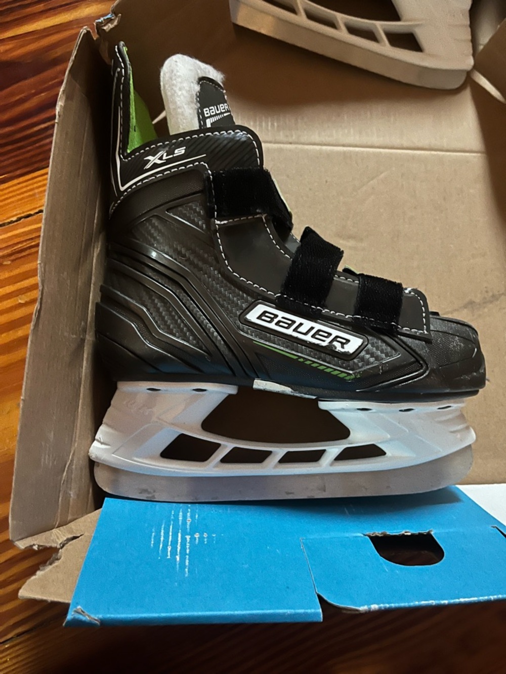 Bauer Kids Black Skates with White Holders and Green Accents